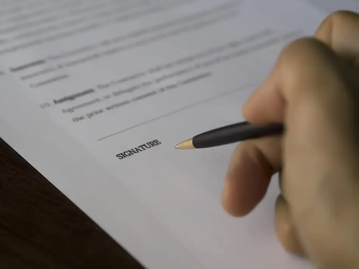 signing a purchase contract to sell a house
