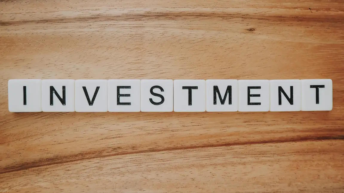 Alternative [market_city] or Cincinnati Real Estate Investment Methods: Notes, REITs, and Wholesaling Explained - scrabble letters spelling investment