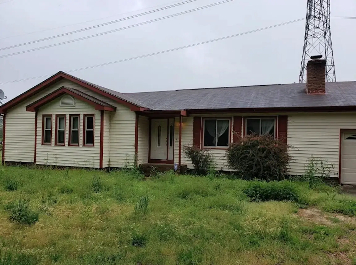 sell a storm-damaged house in Durham, NC