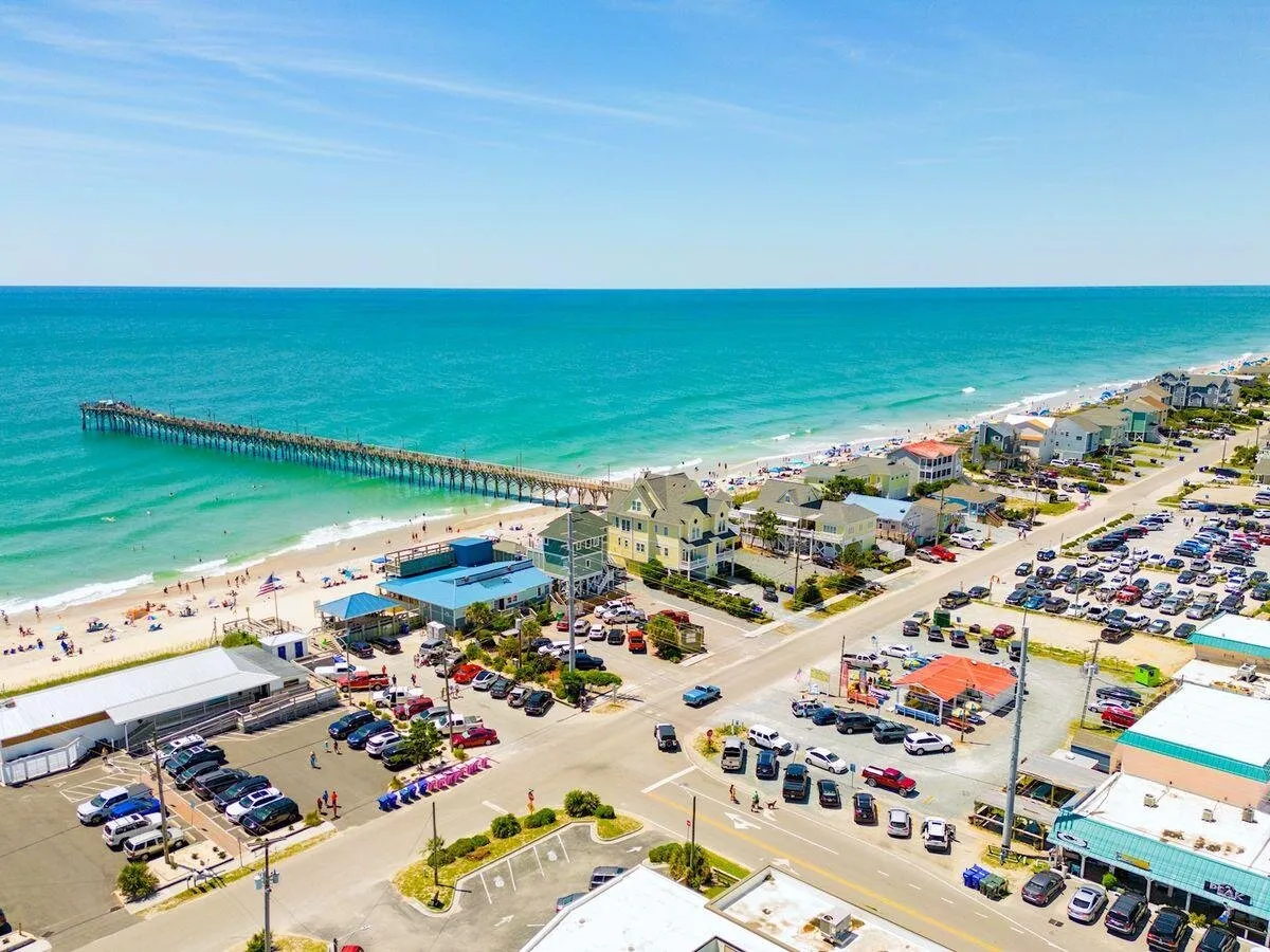 Aerial view of the Surf City pier, beach, and town streets in Surf City, North Carolina