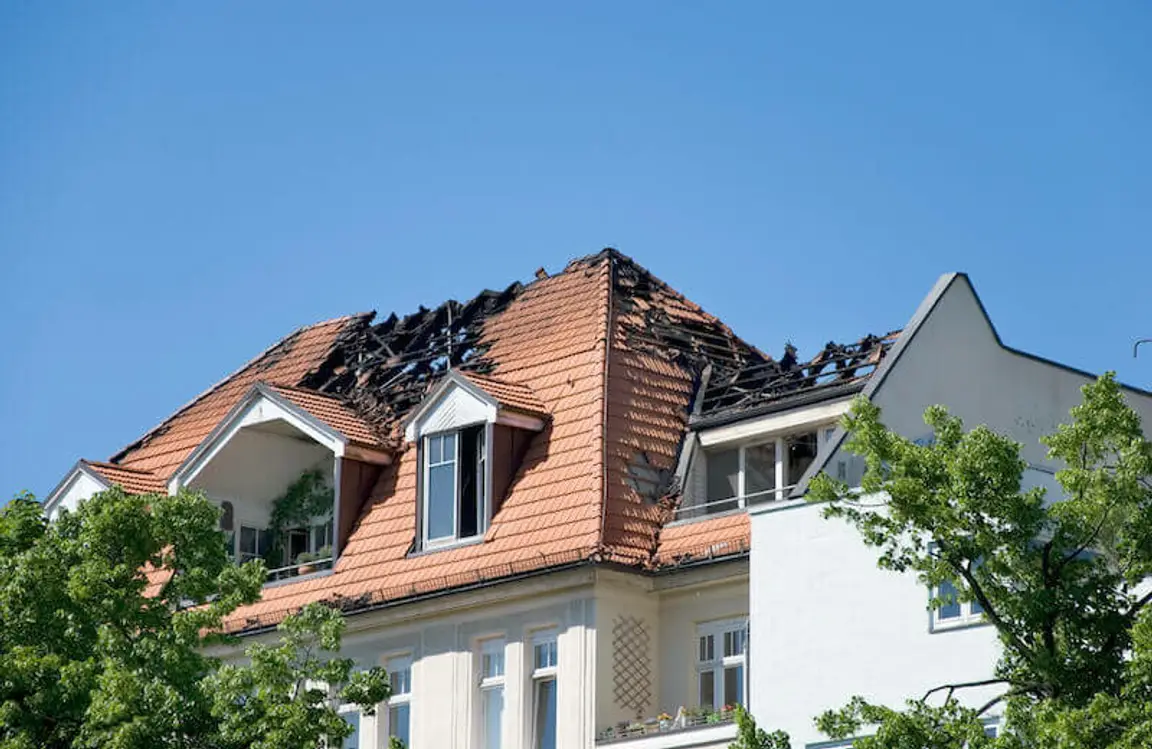 Fire Damaged House in MA for sale