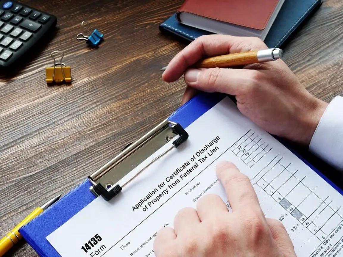 Can you transfer property with a lien attached