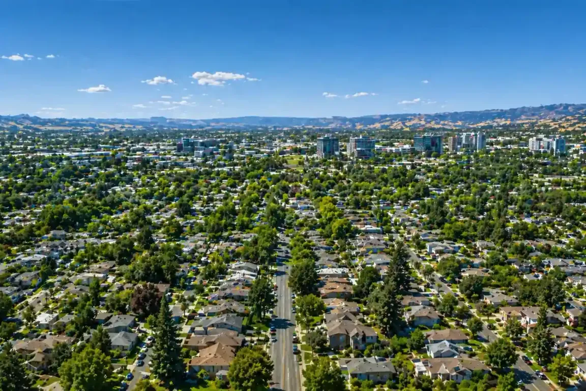 aerial view of santa clara ca neighborhoods with subtle dark overlay for heading text sell my house fast santa clara cash home buyers