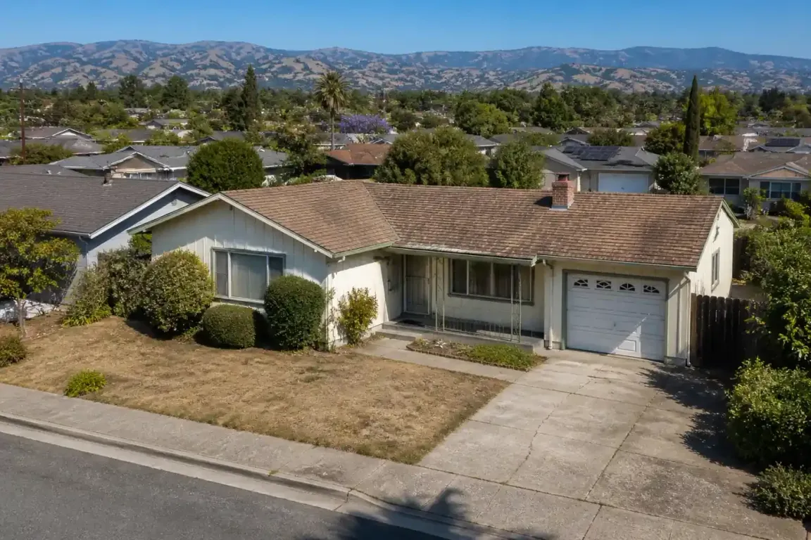 Sell my house fast in probate San Jose CA aerial view of older home