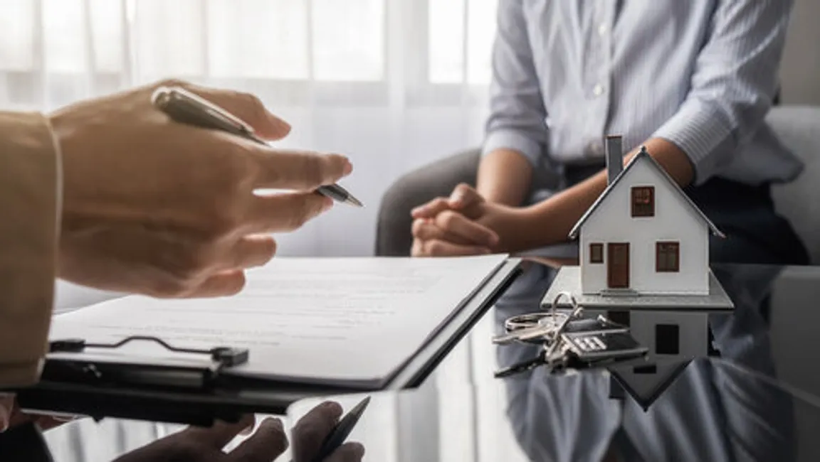 homebuyer discussing fair contract terms with home seller