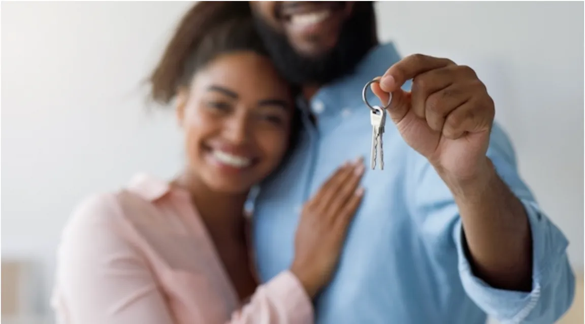 Couple excited about purchasing their house