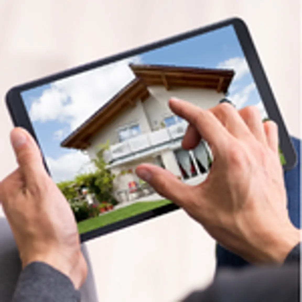 man looking at a house