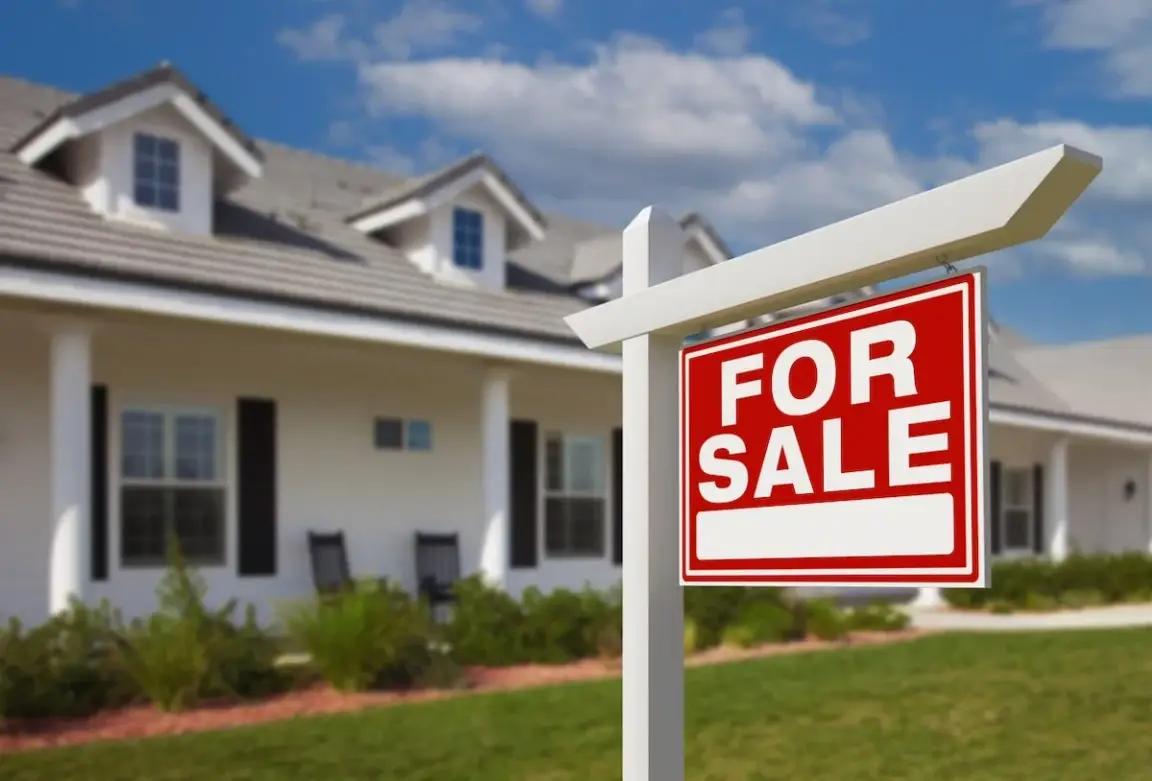 home with for sale sign