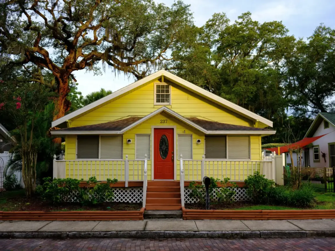 yellow home with red door florida