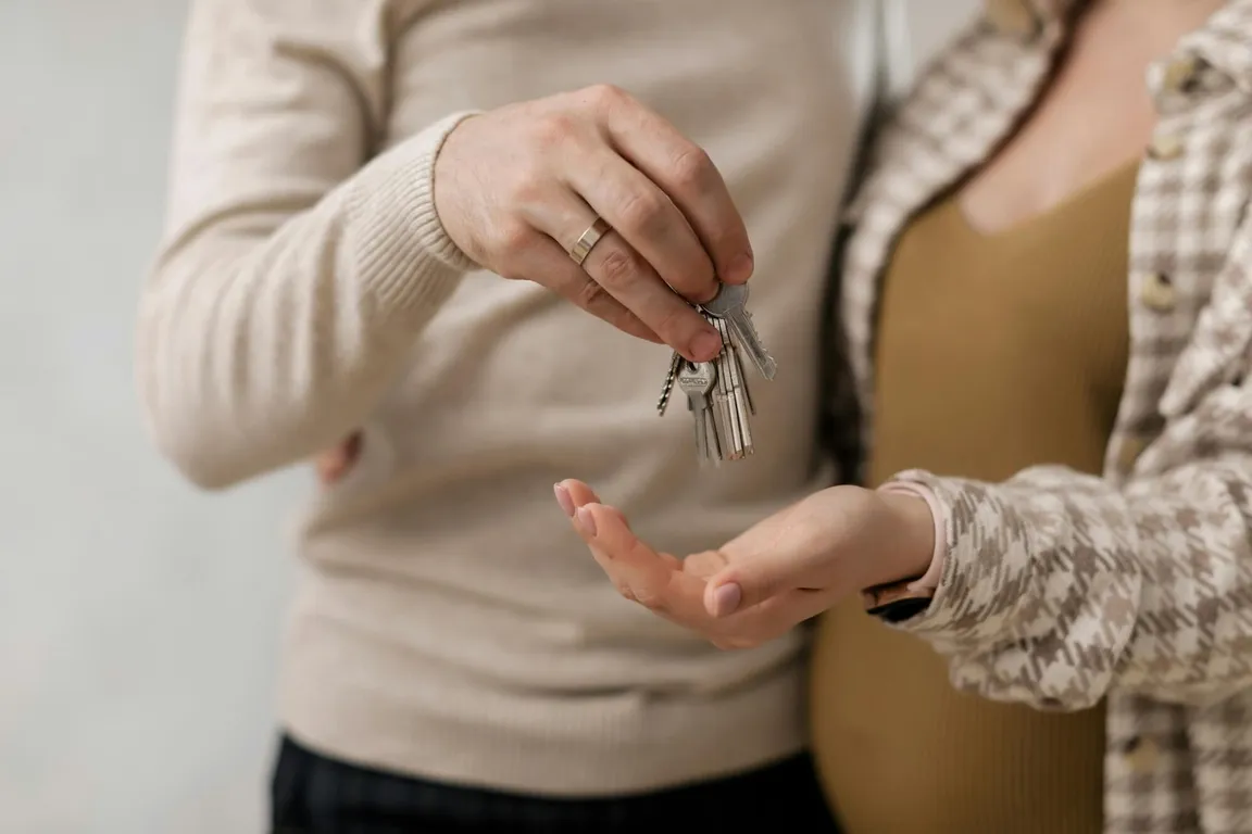 couple holding house keys