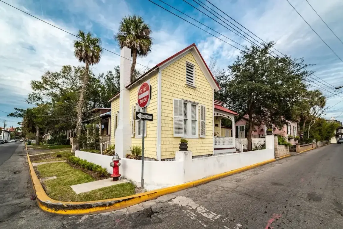 yellow Florida home on corner lot