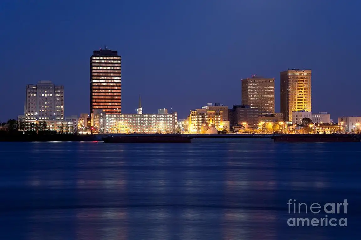 A Bright City at Night | Buying a House From Owner