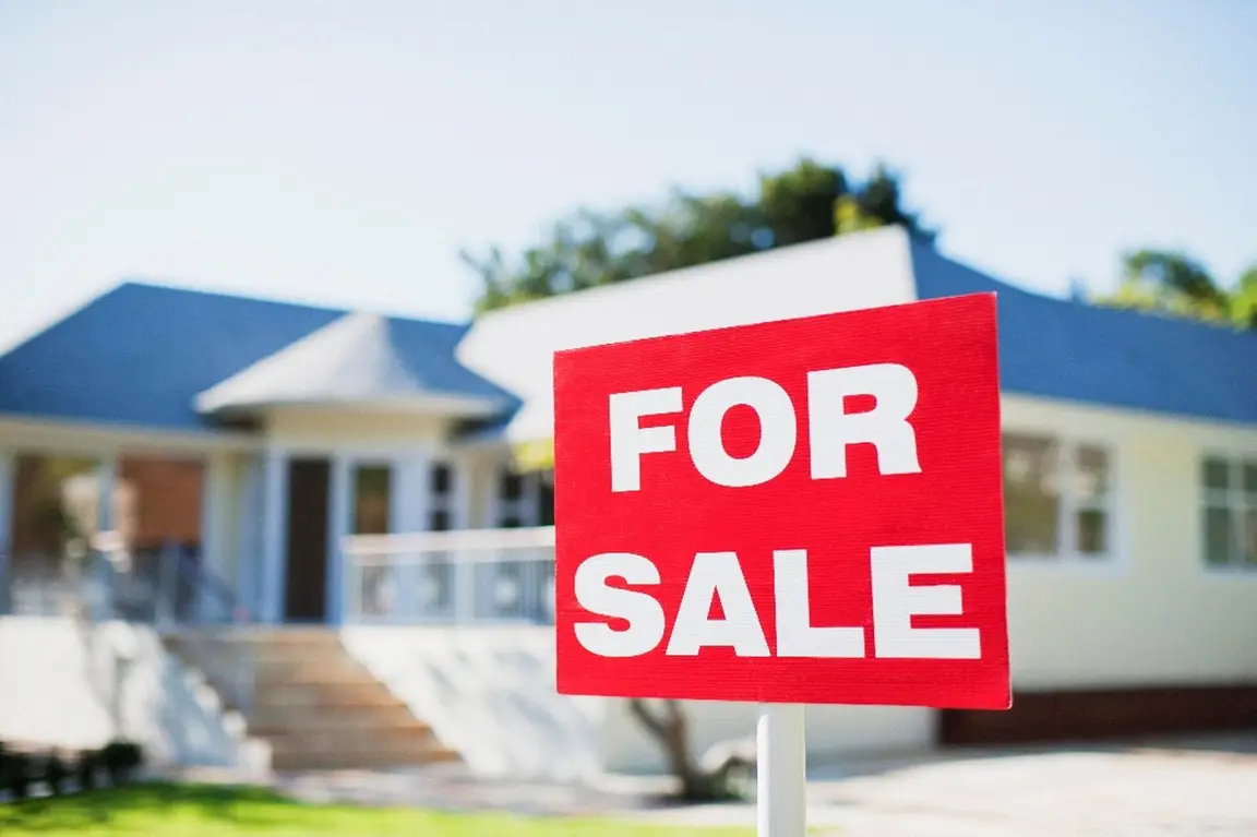 A “For Sale” Sign in Front of a Property | Selling a House for Cash