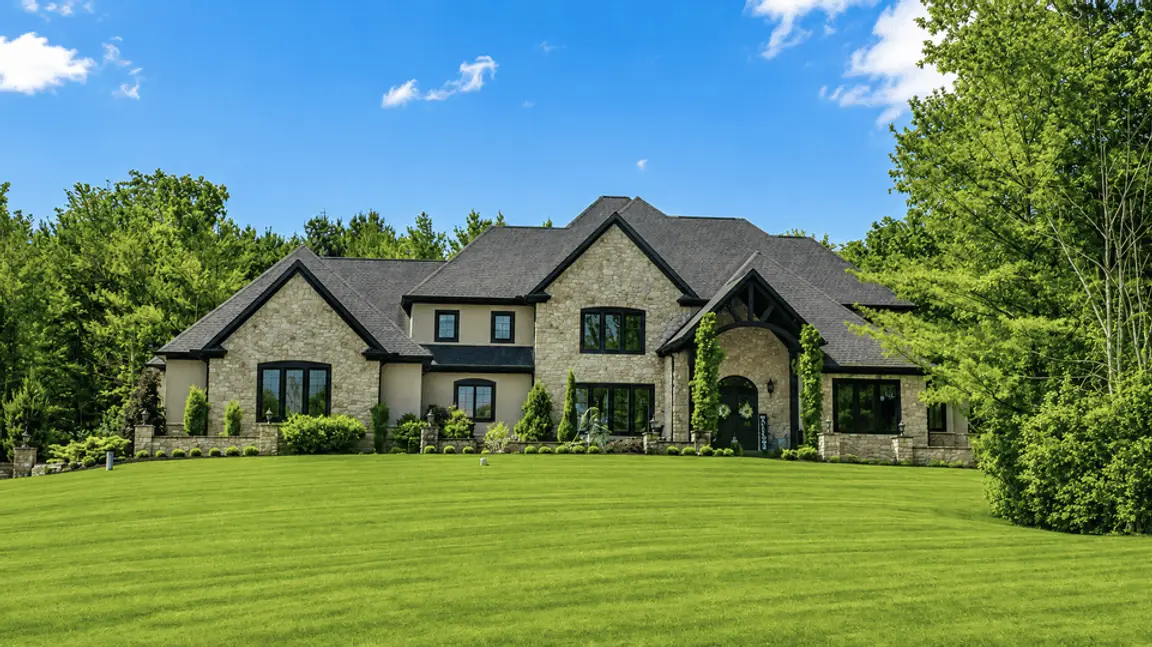 Full stone front 2-story home in The Estates at Ridgemont in Hinckley, Ohio 44233. This subdivision comprises Pine Grove Cir, Ridgemont Trl, and three homes on Ridge Rd. It includes 29 custom-built luxury homes that primarily range from 2,700-6,600 above-grade square feet with 2+ acre lots surrounded by streams and rolling topography.