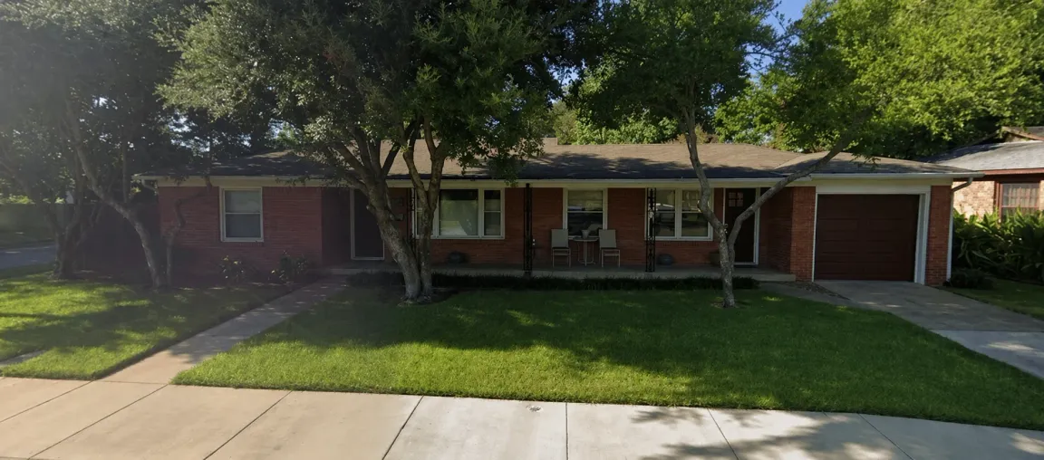 Front exterior of Oak Summit Group home office in Westworth Village, Texas with brick facade, front porch, and shaded lawn in a quiet residential neighborhood