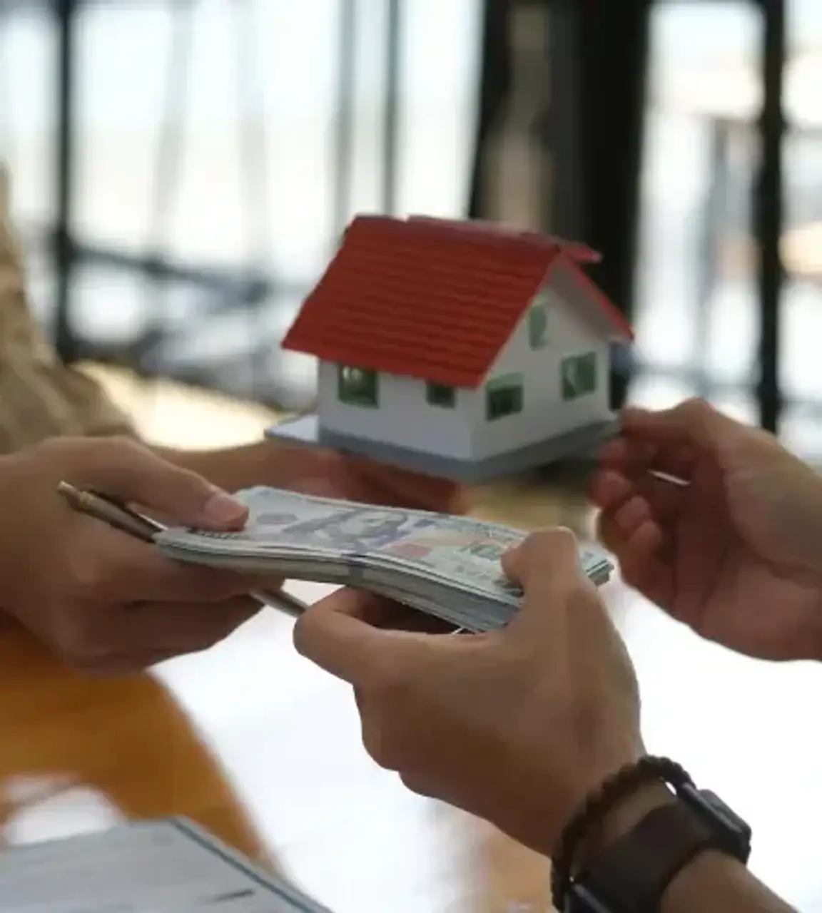 Homeowner receiving cash from a property sale