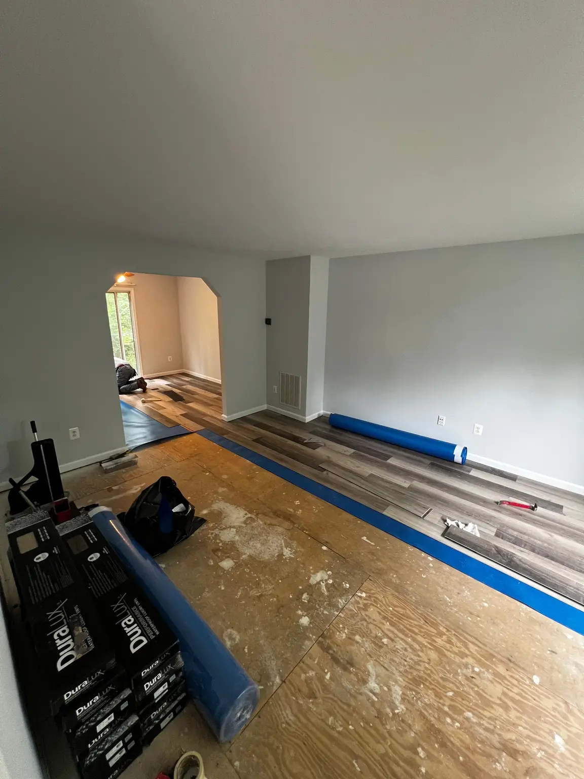 Home interior undergoing flooring repairs.