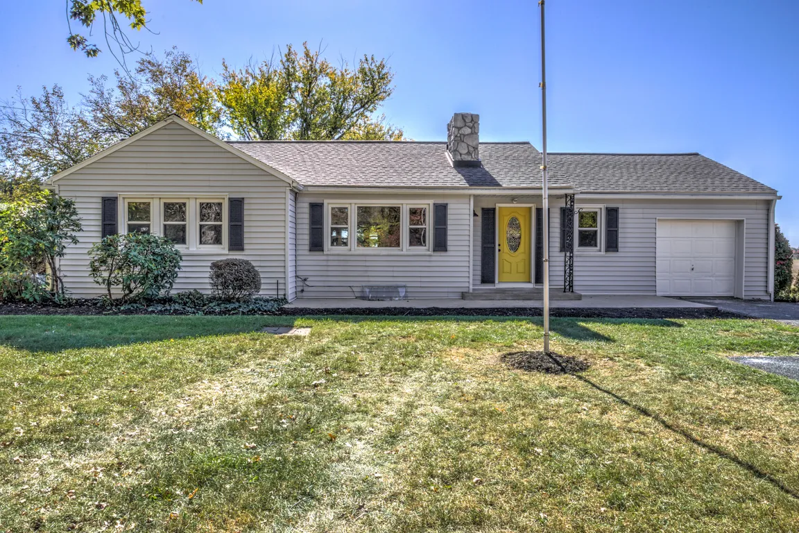 Front of a white home we bought in Dauphin County