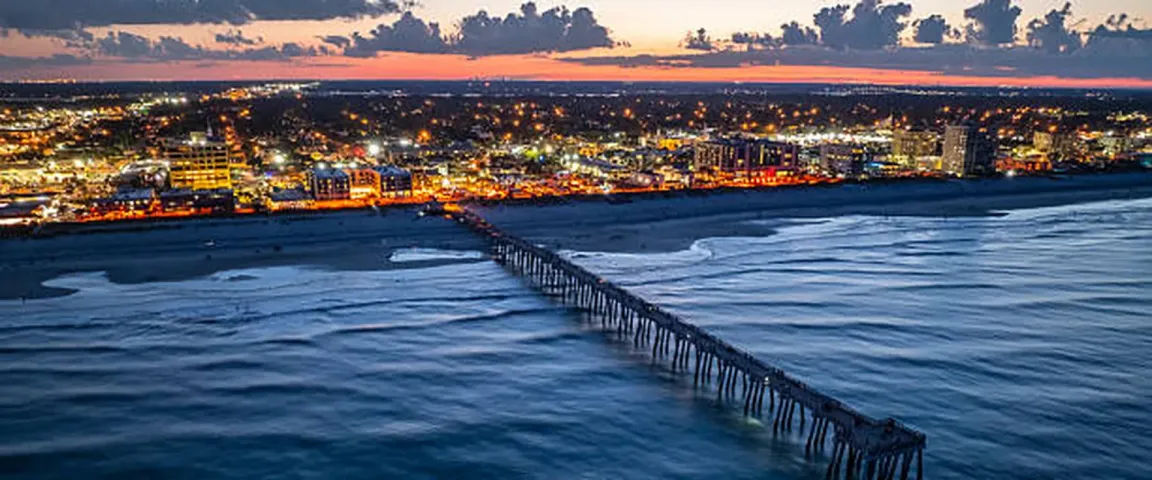 Sell my house fast in Jacksonville Beach FL - Jacksonville Beach pier at sunset