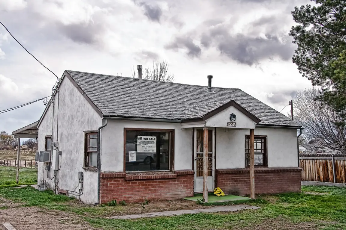boarded up house