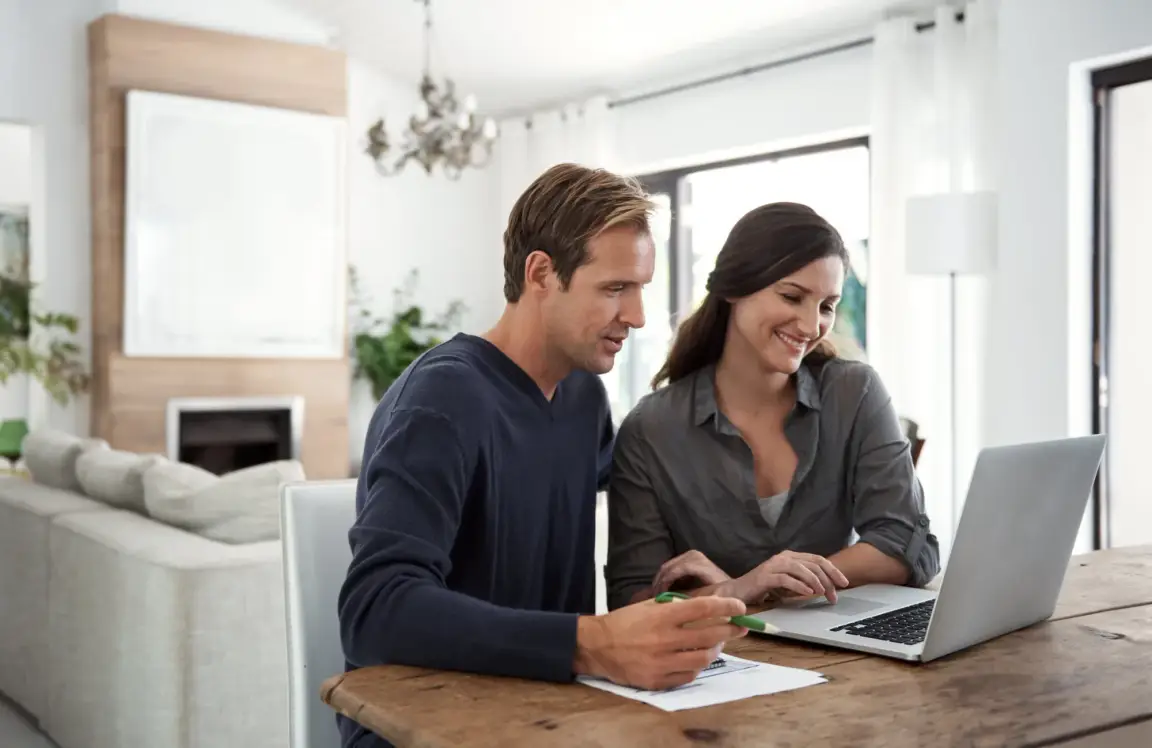couple looking at computer