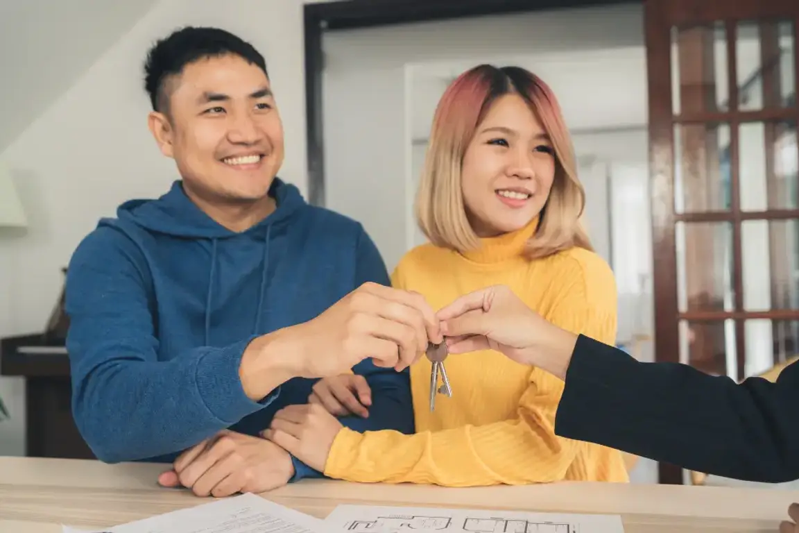 Couple getting handed with Keys