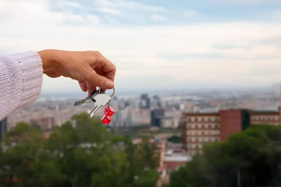 hand holding a key
