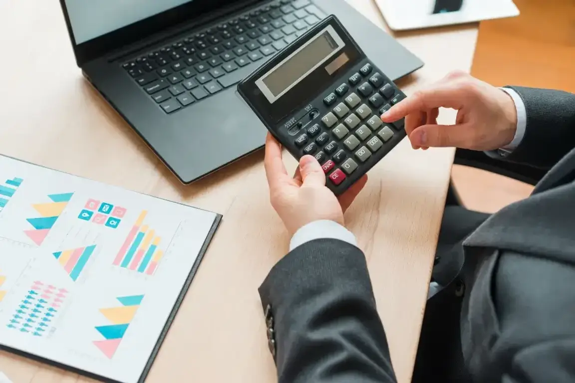 person using a calculator
