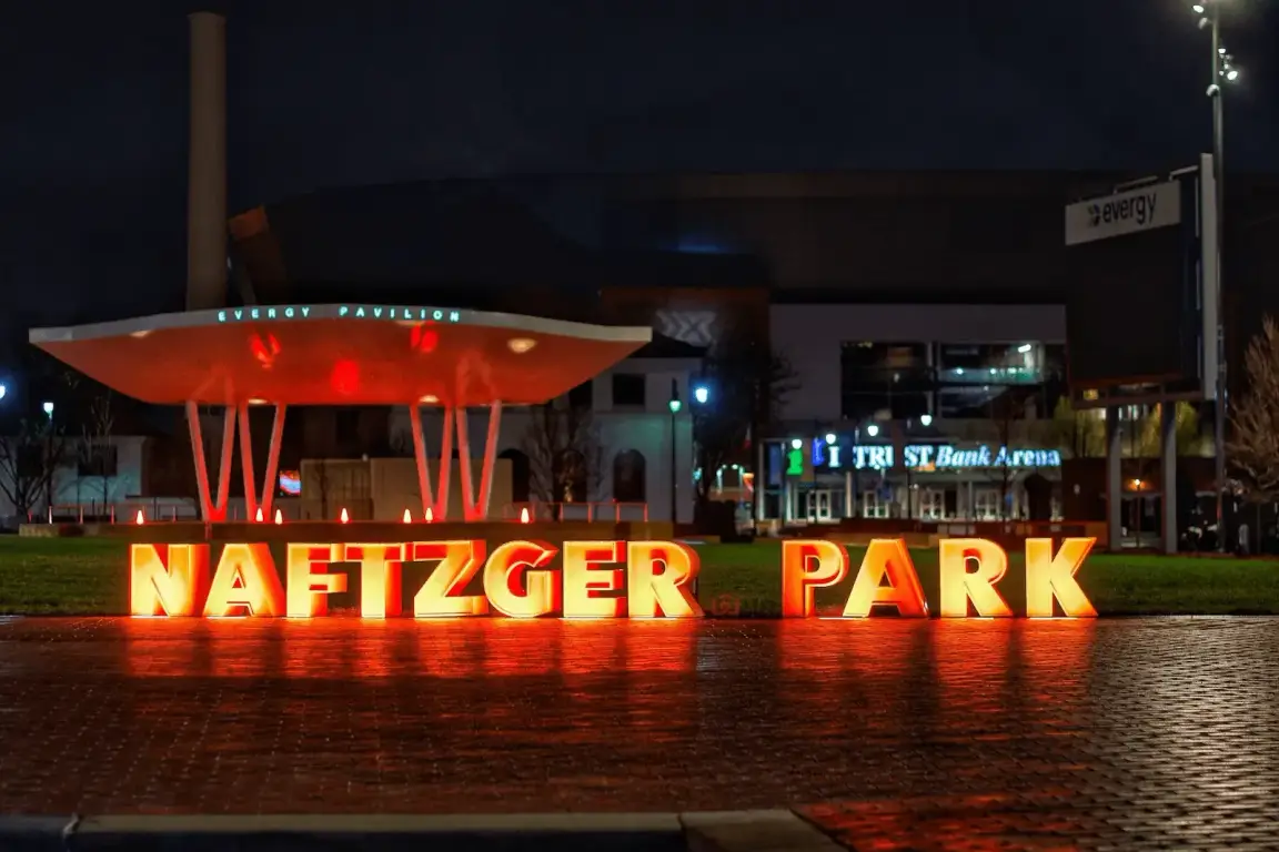 Naftzger Park in downtown Wichita at night — Home Buyers ICT, cash home buyers serving Wichita KS.