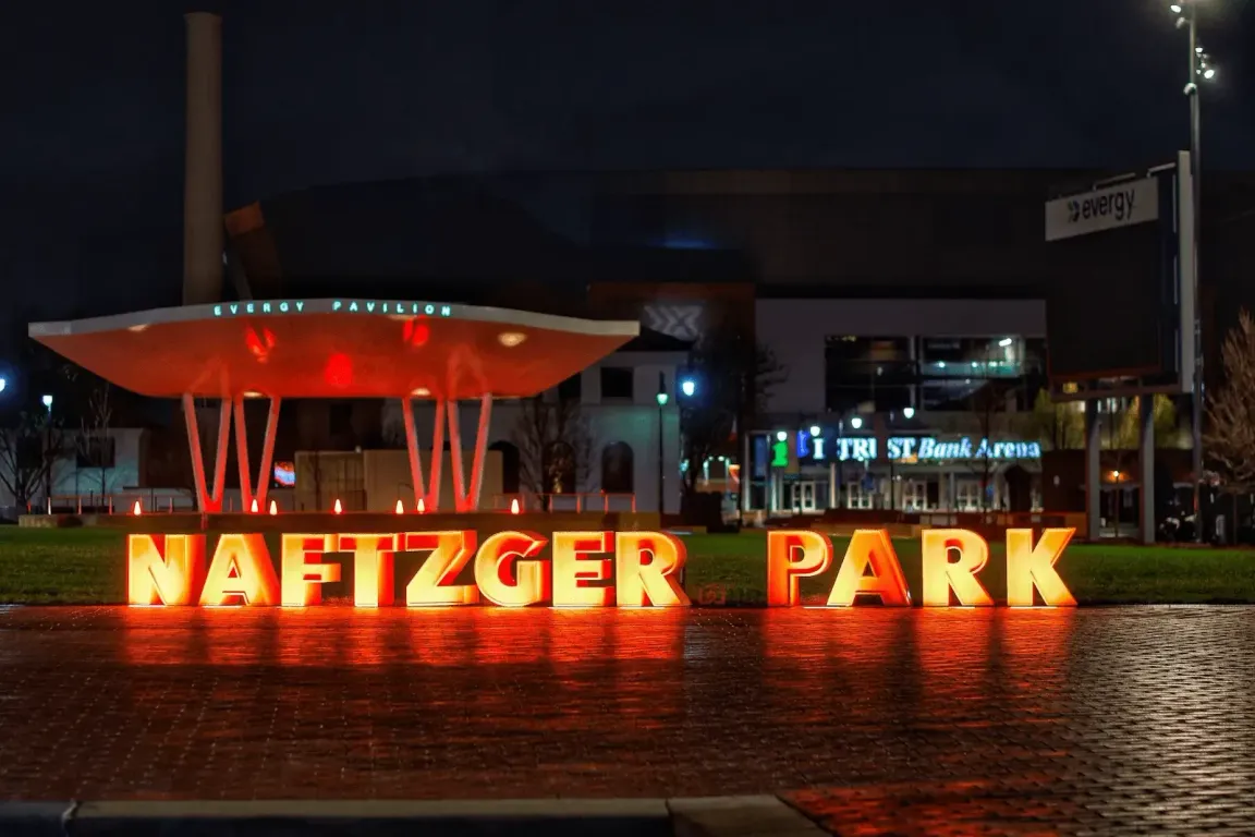 Naftzger Park in downtown Wichita at night — Home Buyers ICT, cash home buyers serving Wichita KS.