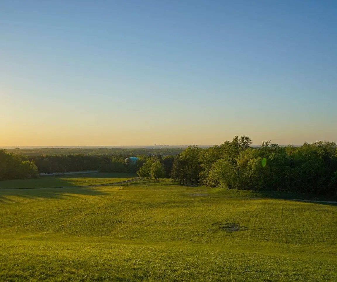 sell land to a developer in New York