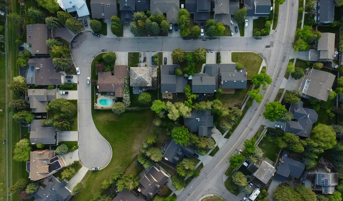 Aerial view of a suburban neighborhood of houses and streets