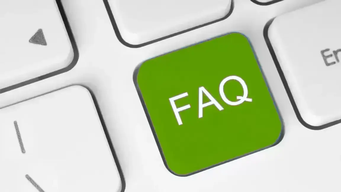 Keyboard With Green FAQ Letter