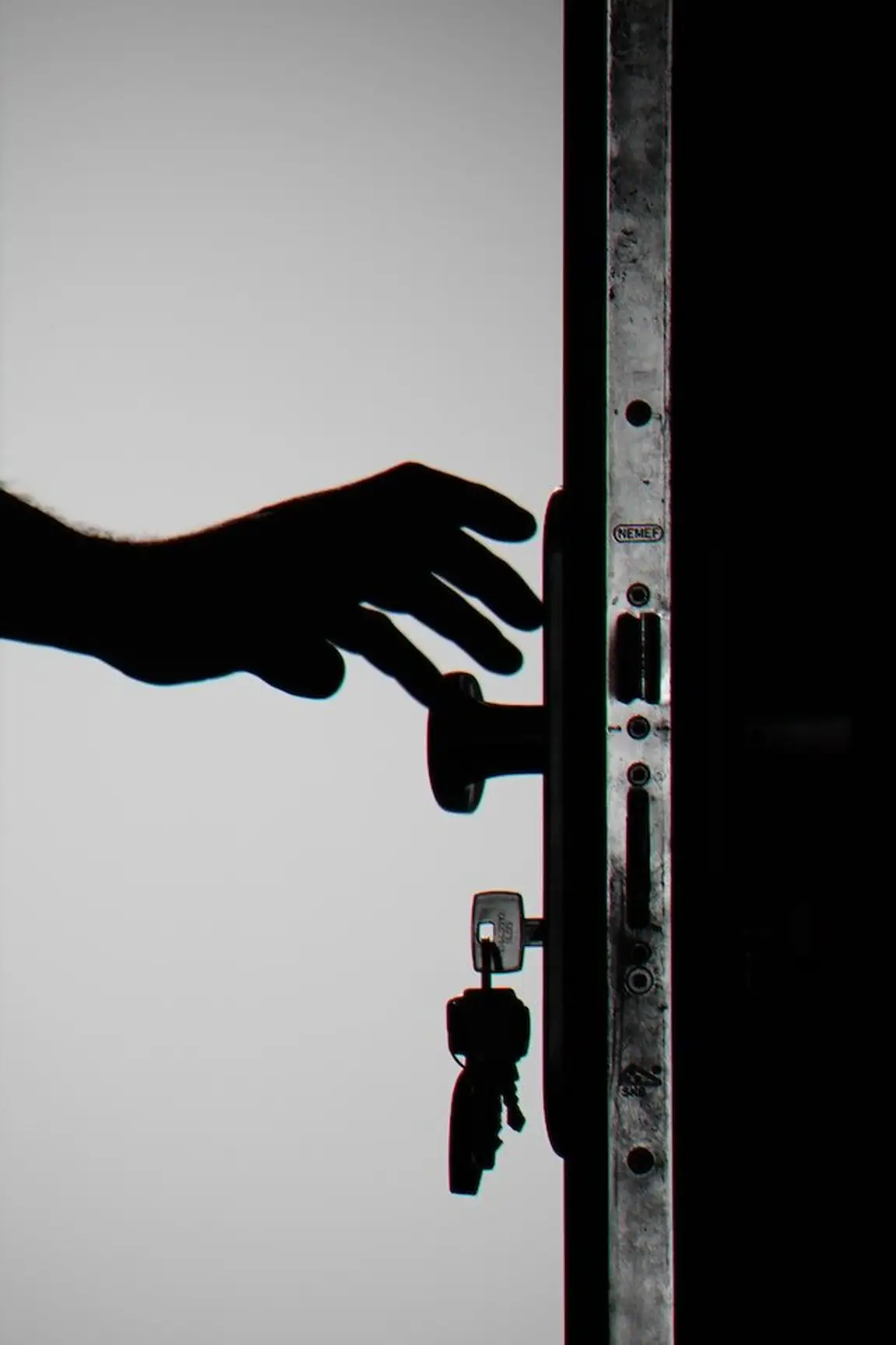 Seller locking the door to a home