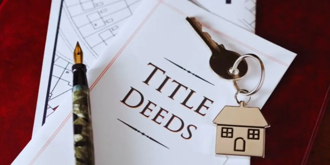 Title deed paperwork ready to be signed.