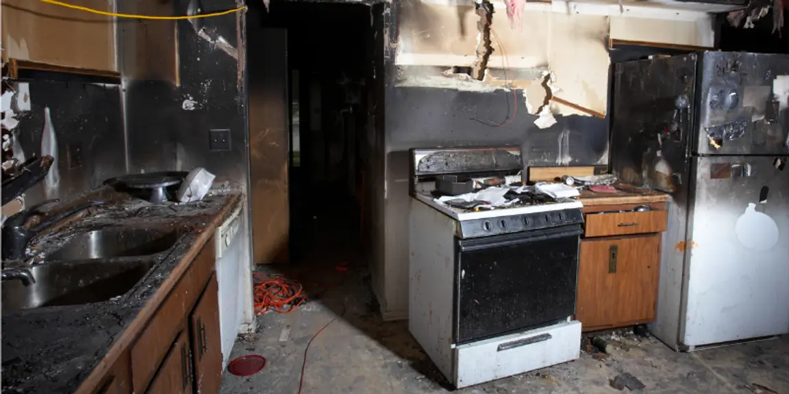 A fire damaged kitchen.