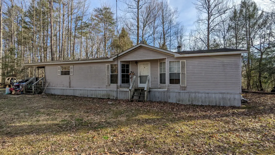 gray white doublewide mobile home cosby tn