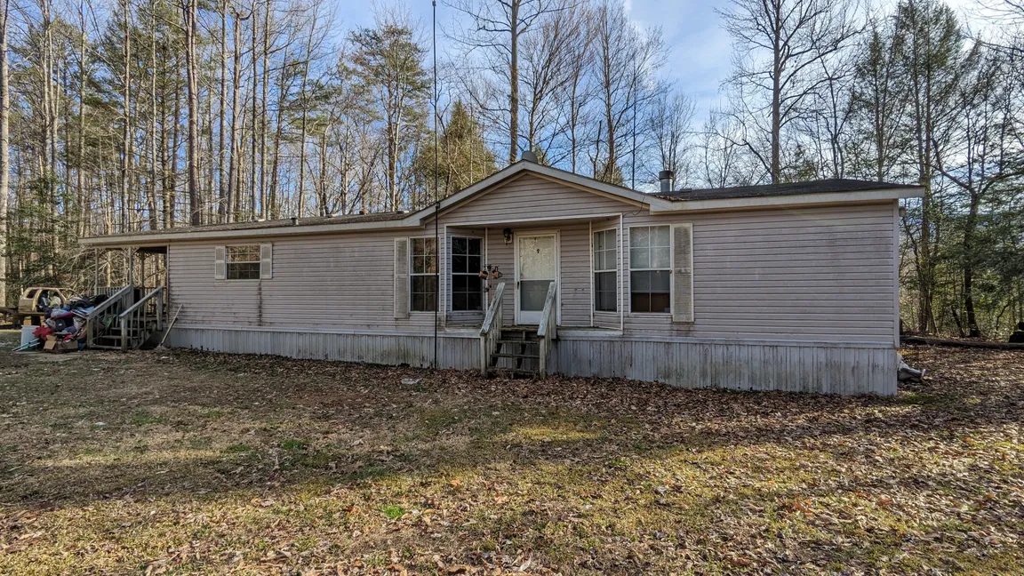 gray white doublewide mobile home cosby tn