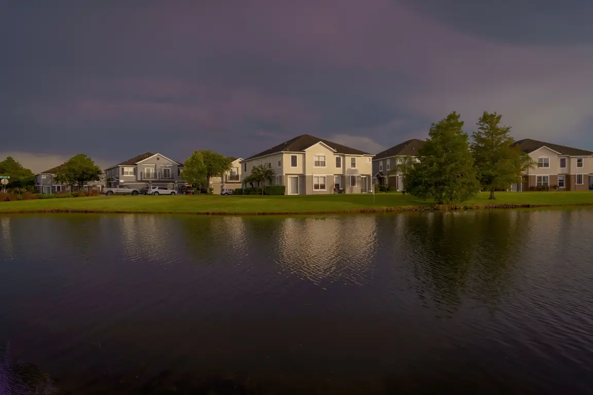 Palm Bay Florida homes at dusk near a lake