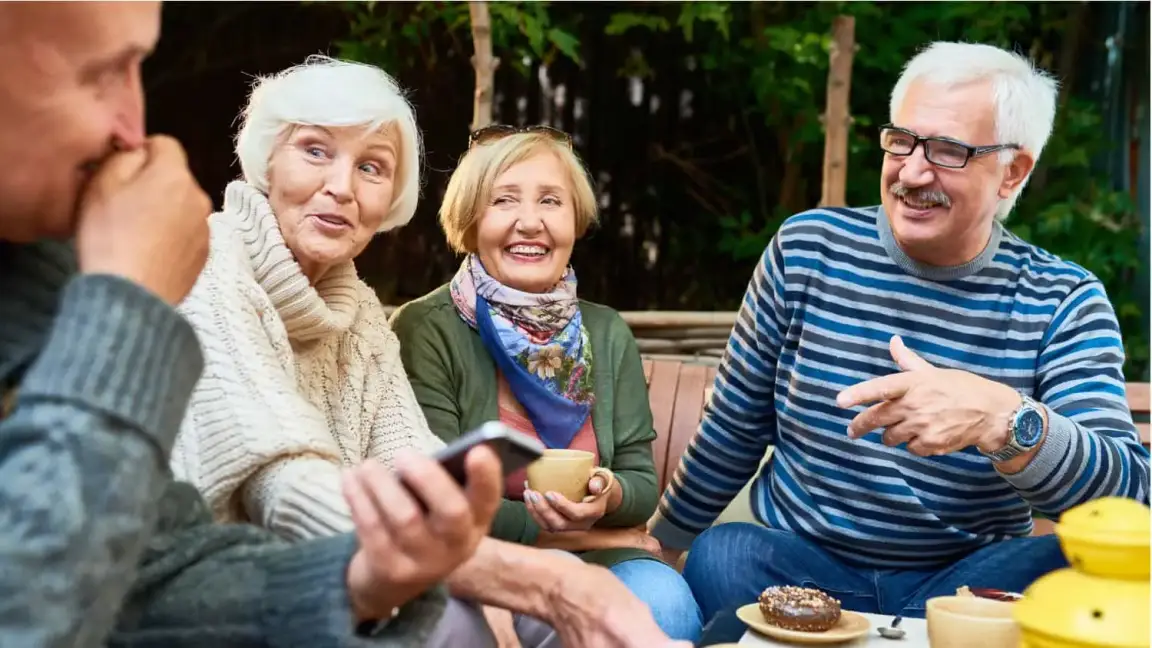 Siblings meeting to discuss selling an inherited house in South Carolina with multiple heirs.