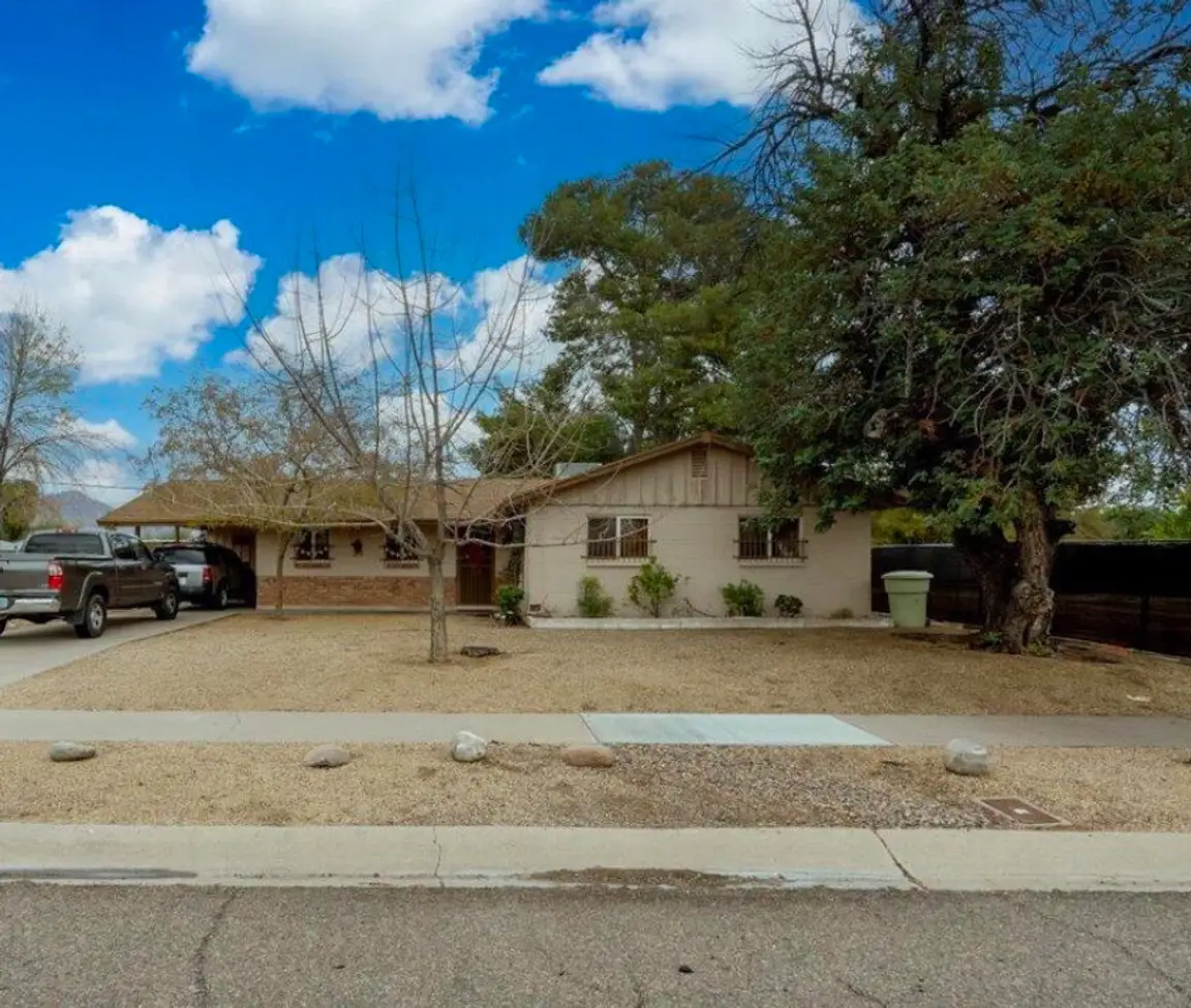 Distressed modern home in Phoenix, AZ ready for a quick cash sale