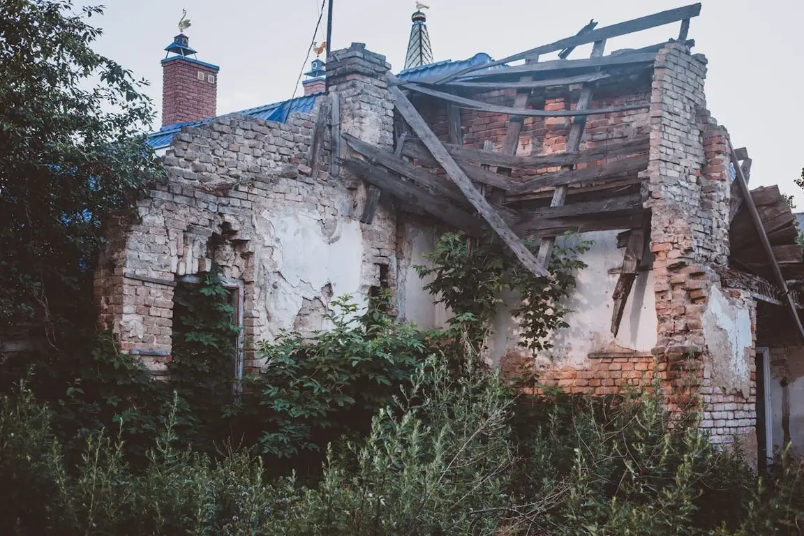 An old house that is broken down and distressed