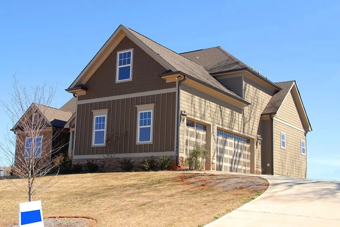 A house that is on a hill that was freshly built