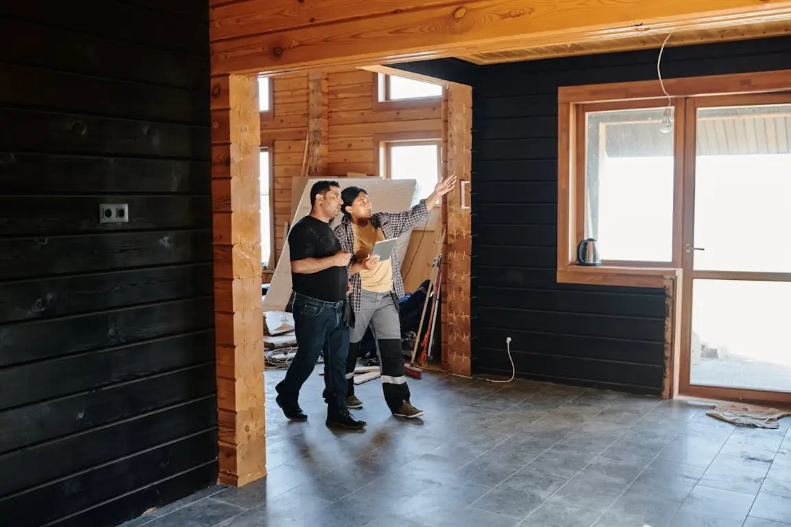 A couple people doing a home inspection