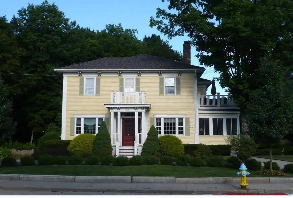 Well-kept colonial home on Concord Street in Nashua, New Hampshire, representing a typical family house passed down to heirs