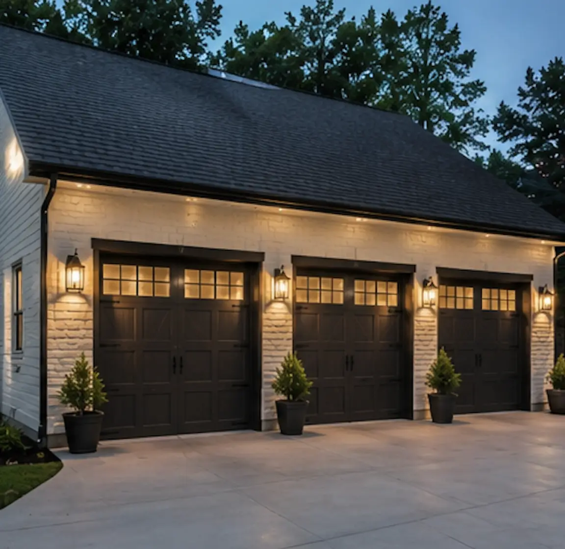 Remodeled outdoor garage by Redstone Ridge Homes featuring white cladding in a collectors garage
