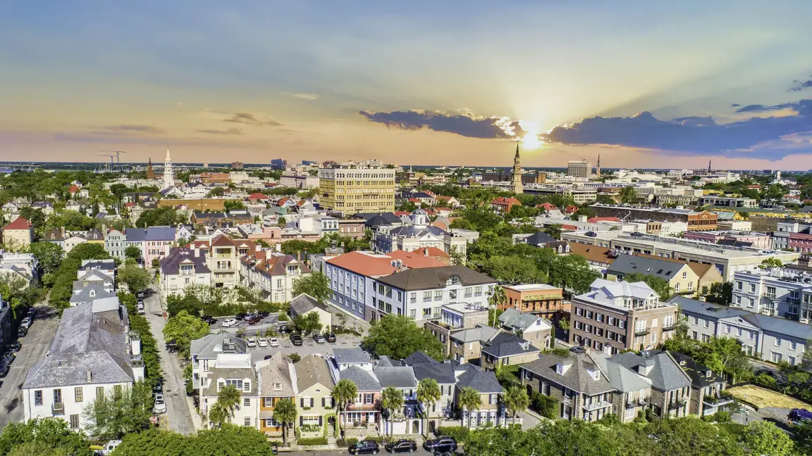 North Charleston, SC skyline with modern buildings and trees representing the local community served by TurnPro Home Buyers