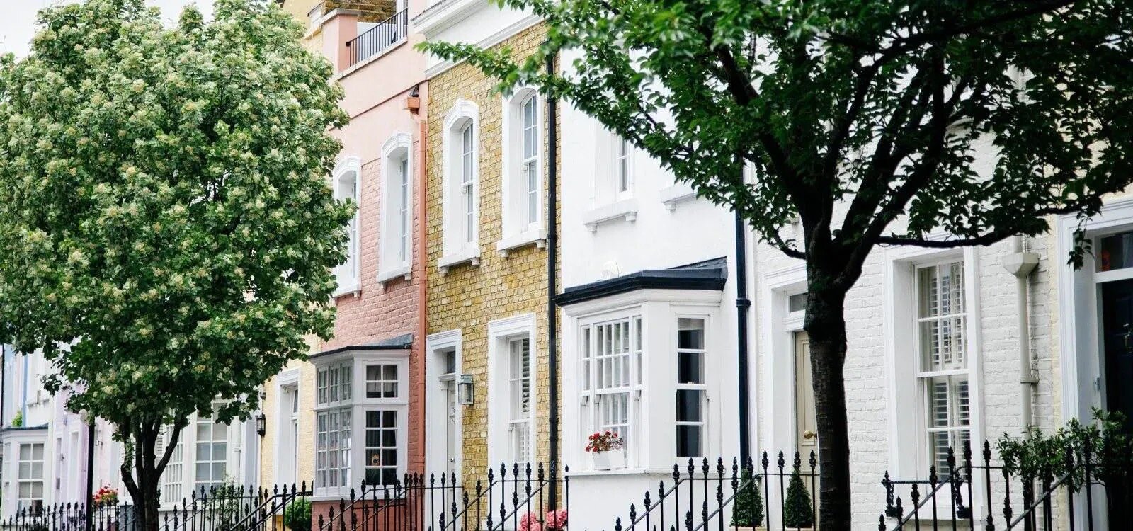Elegant row houses with black gated entryways