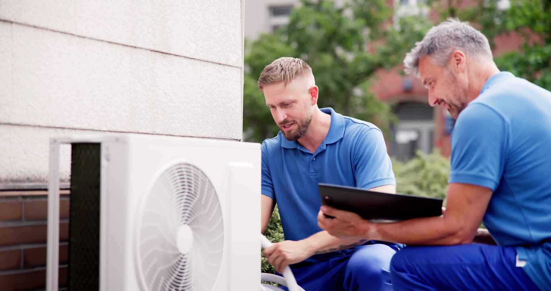 men check hvac fan
