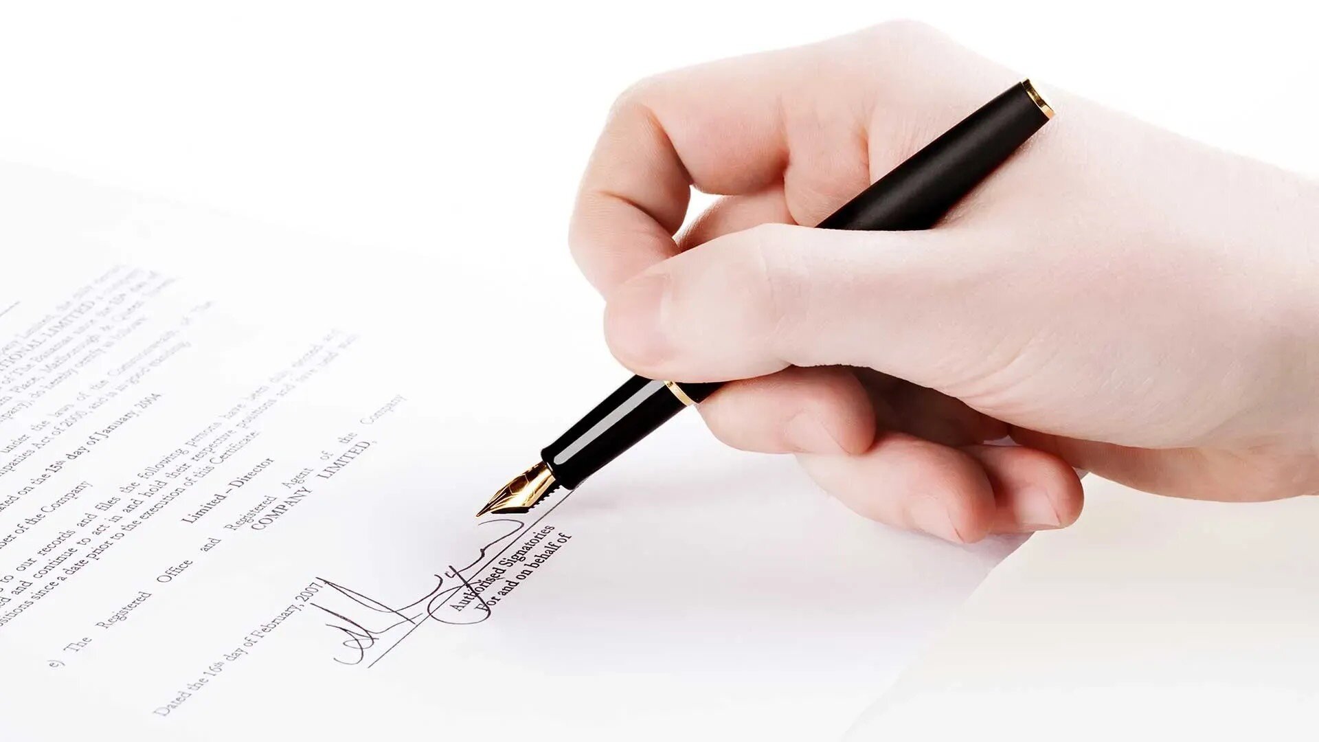Hand signing authorization letter with black ink pen